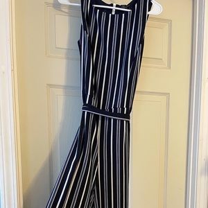 Navy sleeveless Jumpsuit with Pinstripes. Only worn once! Super comfortable!